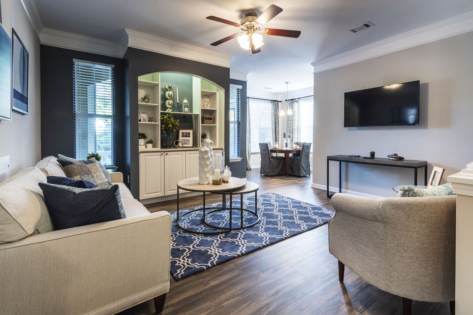 Modern living room with plush seating at Wakefield Glen Apartments, perfect for relaxation and entertaining