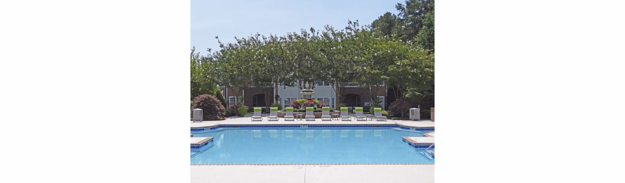 Resort-style pool with lounging areas at Wakefield Glen Apartments for luxury living