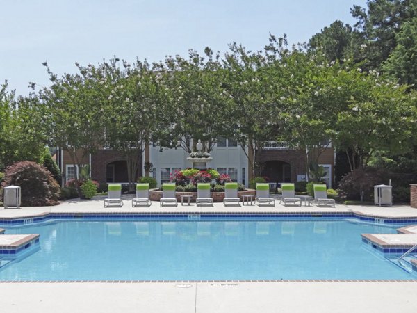 Resort-style pool with lounging areas at Wakefield Glen Apartments for luxury living