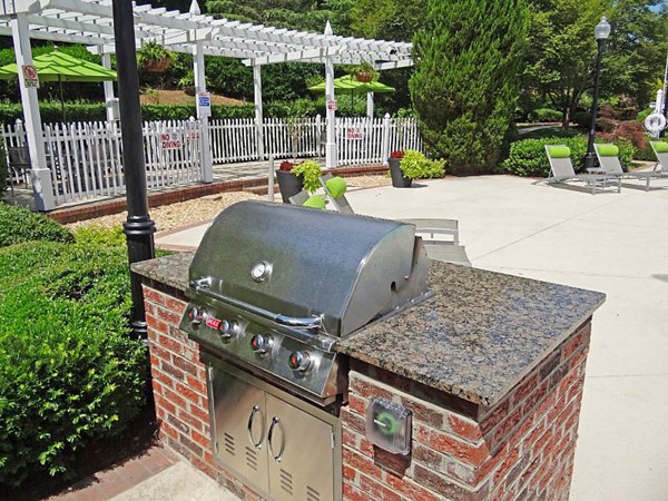 Outdoor grill area with modern design at Wakefield Glen Apartments, perfect for hosting gatherings and enjoying outdoor cooking