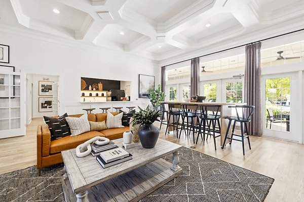 Elegant clubhouse with cozy seating and modern decor at Tradition at Stonewater Apartments