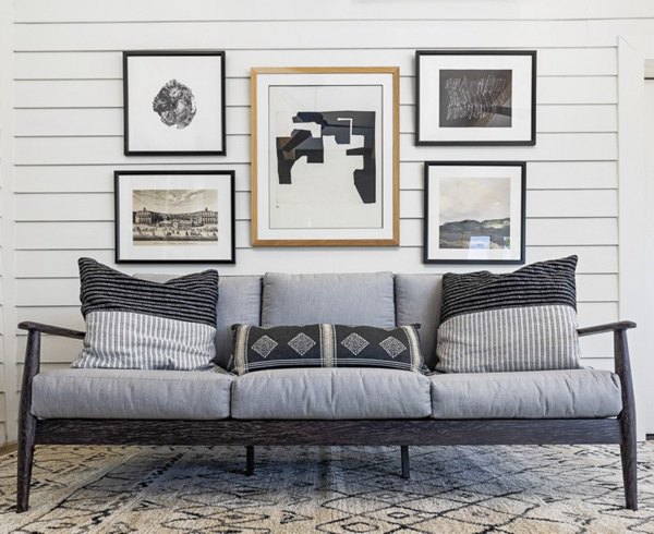 Elegant clubhouse featuring modern decor at Tradition at Stonewater Apartments, perfect for luxury living and community gatherings
