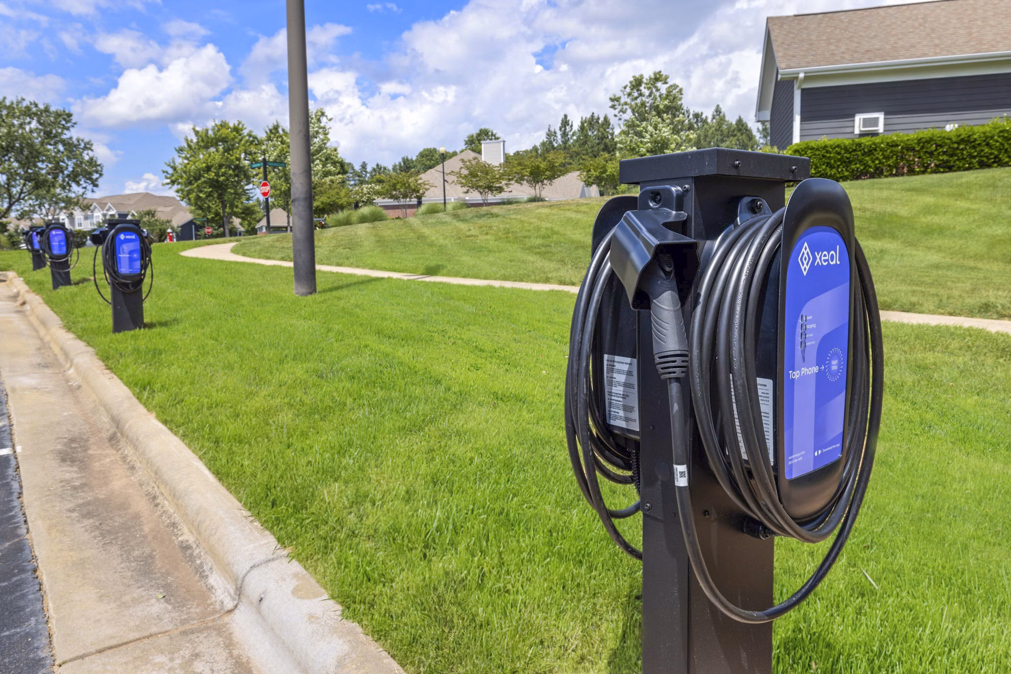 Eco-friendly car charging stations at Tradition at Stonewater Apartments for luxury living convenience
