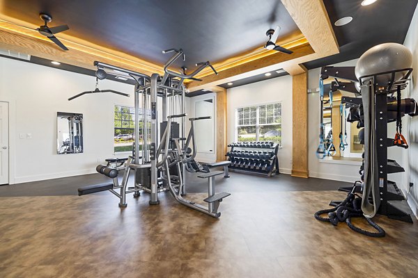 State-of-the-art fitness center with modern equipment at Tradition at Stonewater Apartments for active living enthusiasts