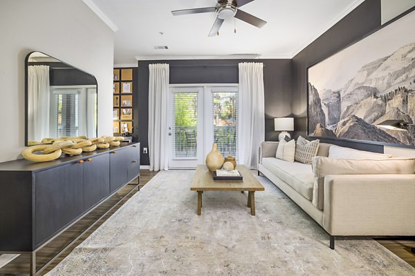 Spacious living room with modern decor at Tradition at Stonewater Apartments