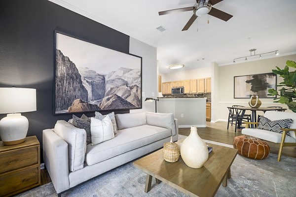 Spacious living room with modern decor at Tradition at Stonewater Apartments
