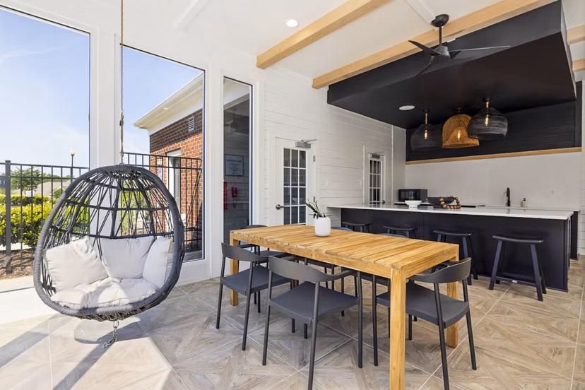 Spacious patio with comfortable seating at Tradition at Stonewater Apartments