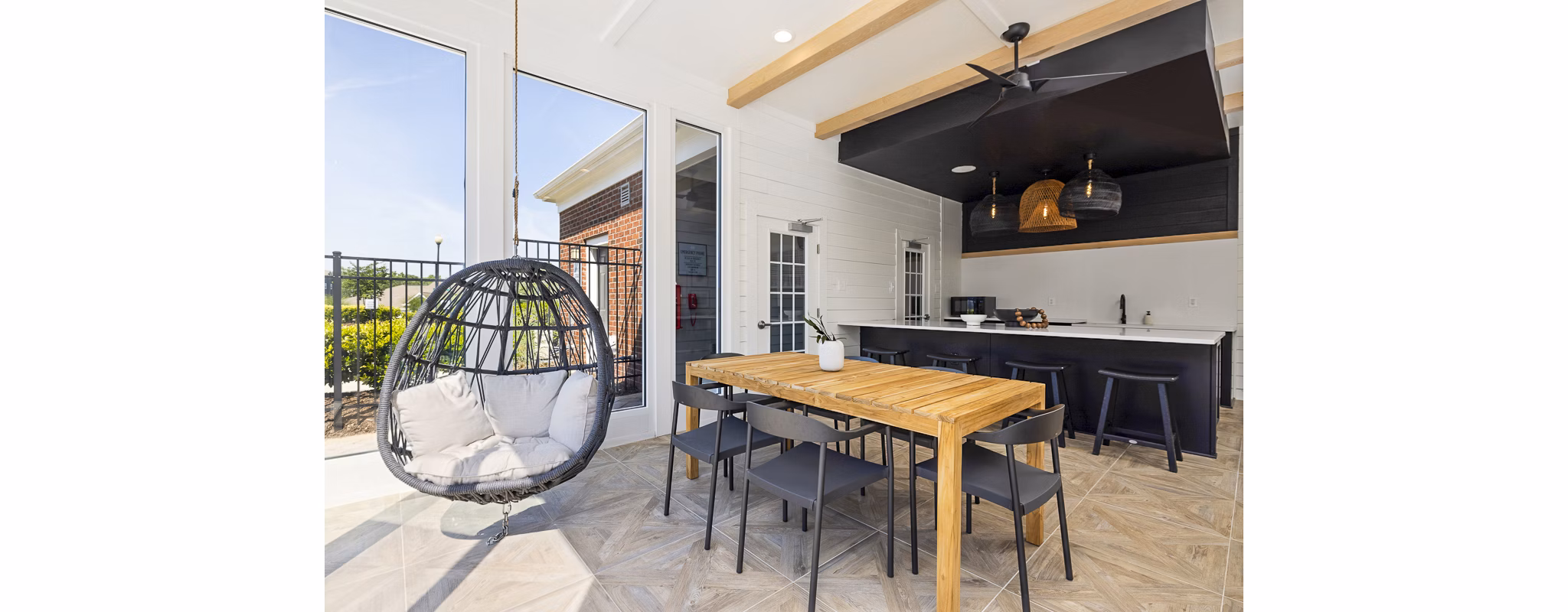 Spacious patio with comfortable seating at Tradition at Stonewater Apartments