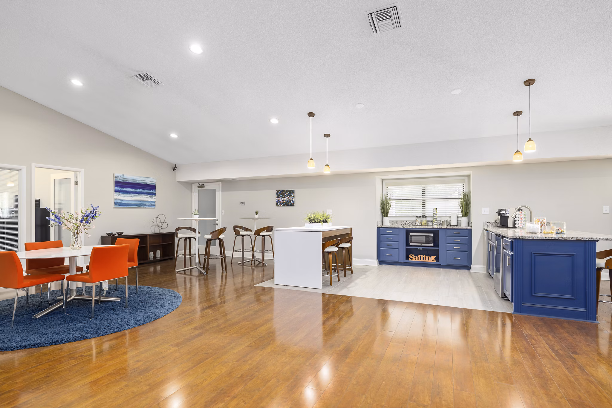 Modern clubhouse with stylish furnishings at Sailboat Bay Apartments