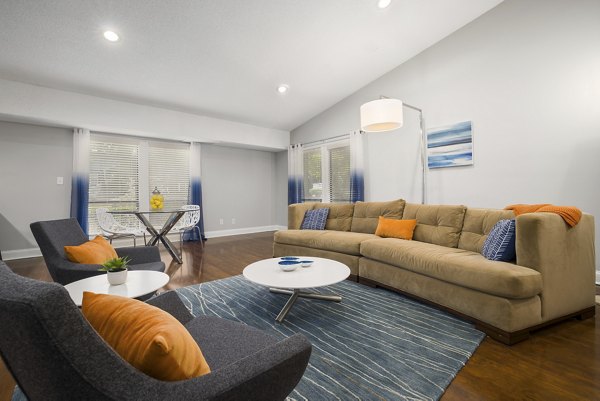 Clubhouse at Sailboat Bay Apartments: Elegant gathering space featuring modern design and comfortable seating