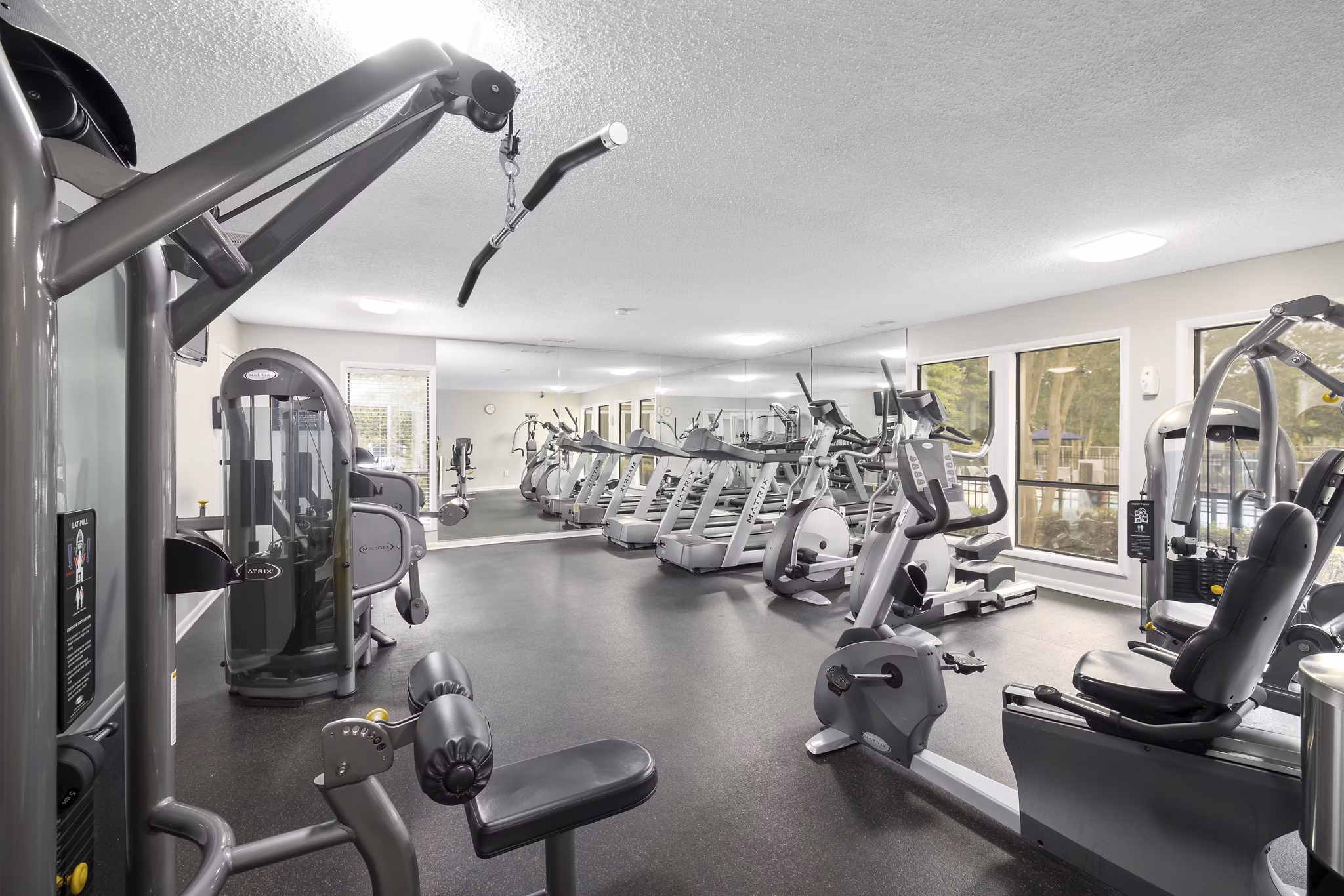 Sailboat Bay Apartments: Modern fitness center with state-of-the-art equipment for residents' active lifestyle