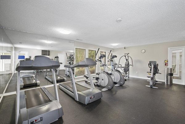 Modern fitness center with state-of-the-art equipment at Sailboat Bay Apartments