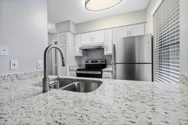 Fitness center with modern equipment at Sailboat Bay Apartments