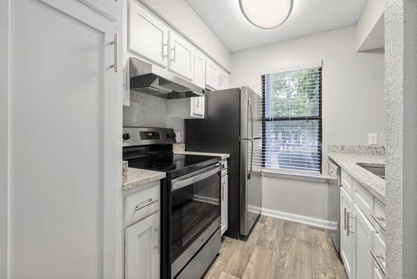 Modern fitness center with state-of-the-art equipment at Sailboat Bay Apartments for active lifestyle enthusiasts