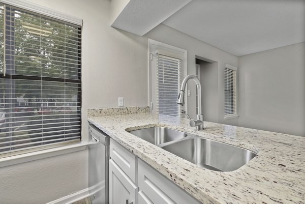 State-of-the-art fitness center with modern equipment at Sailboat Bay Apartments