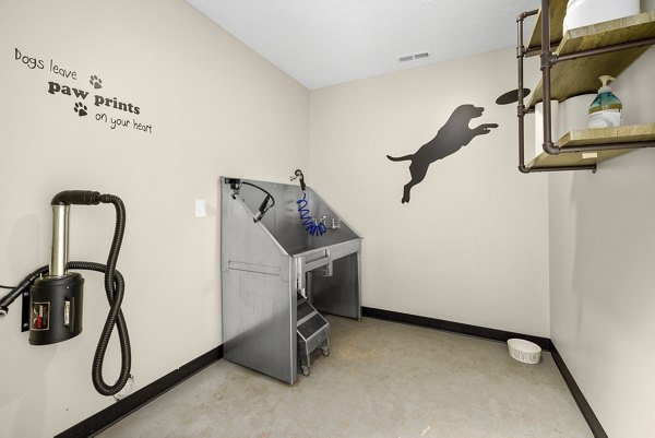 Dog wash station at Sailboat Bay Apartments with modern amenities for pet-friendly living