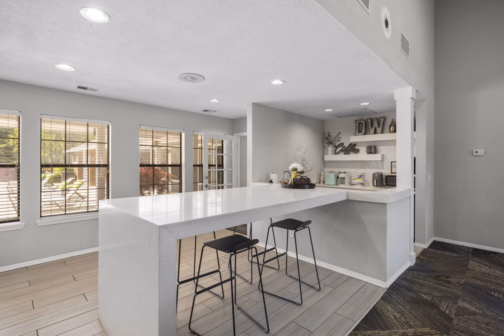 Clubhouse with modern design and comfy seating at Duraleigh Woods Apartments