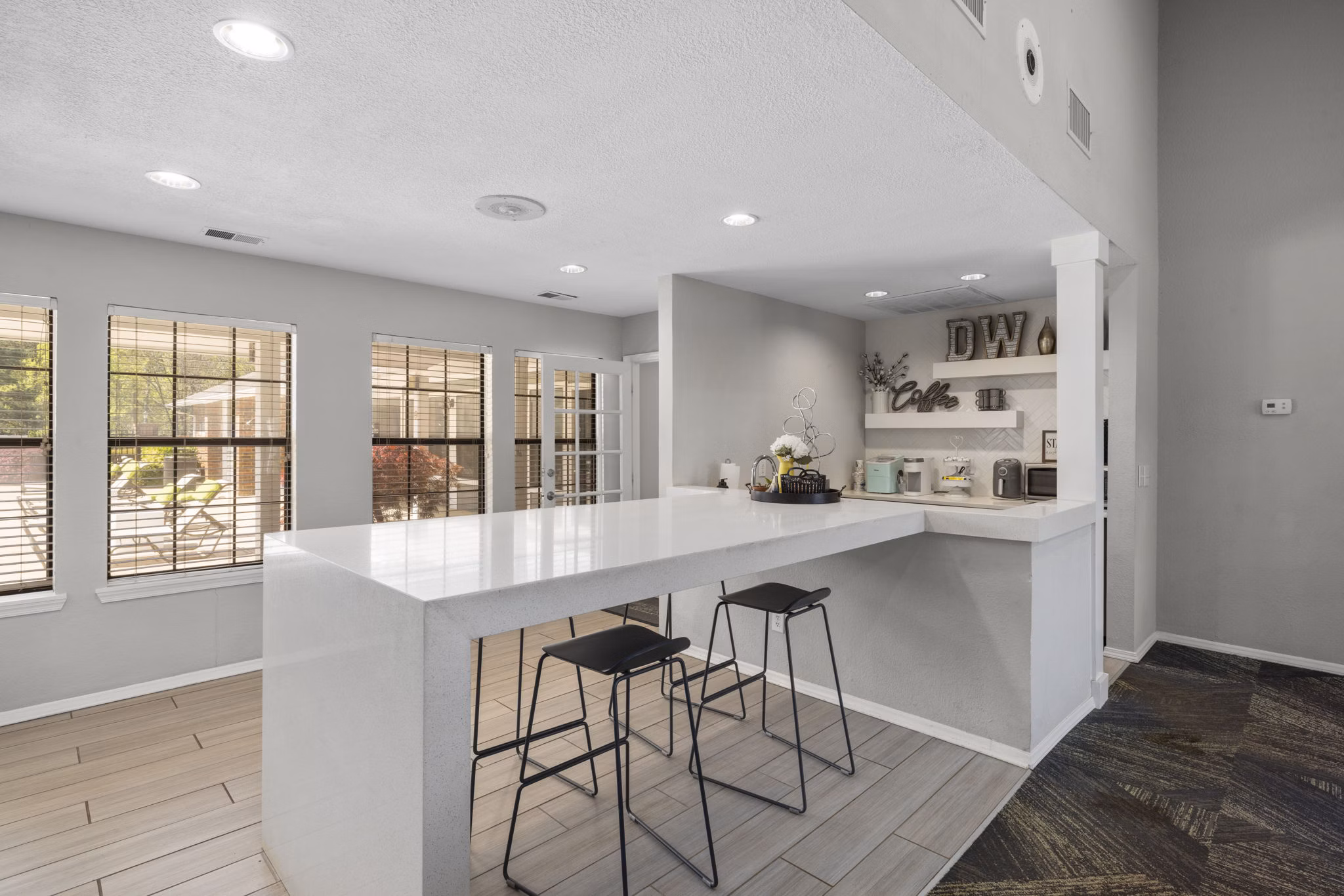 Clubhouse with modern design and comfy seating at Duraleigh Woods Apartments