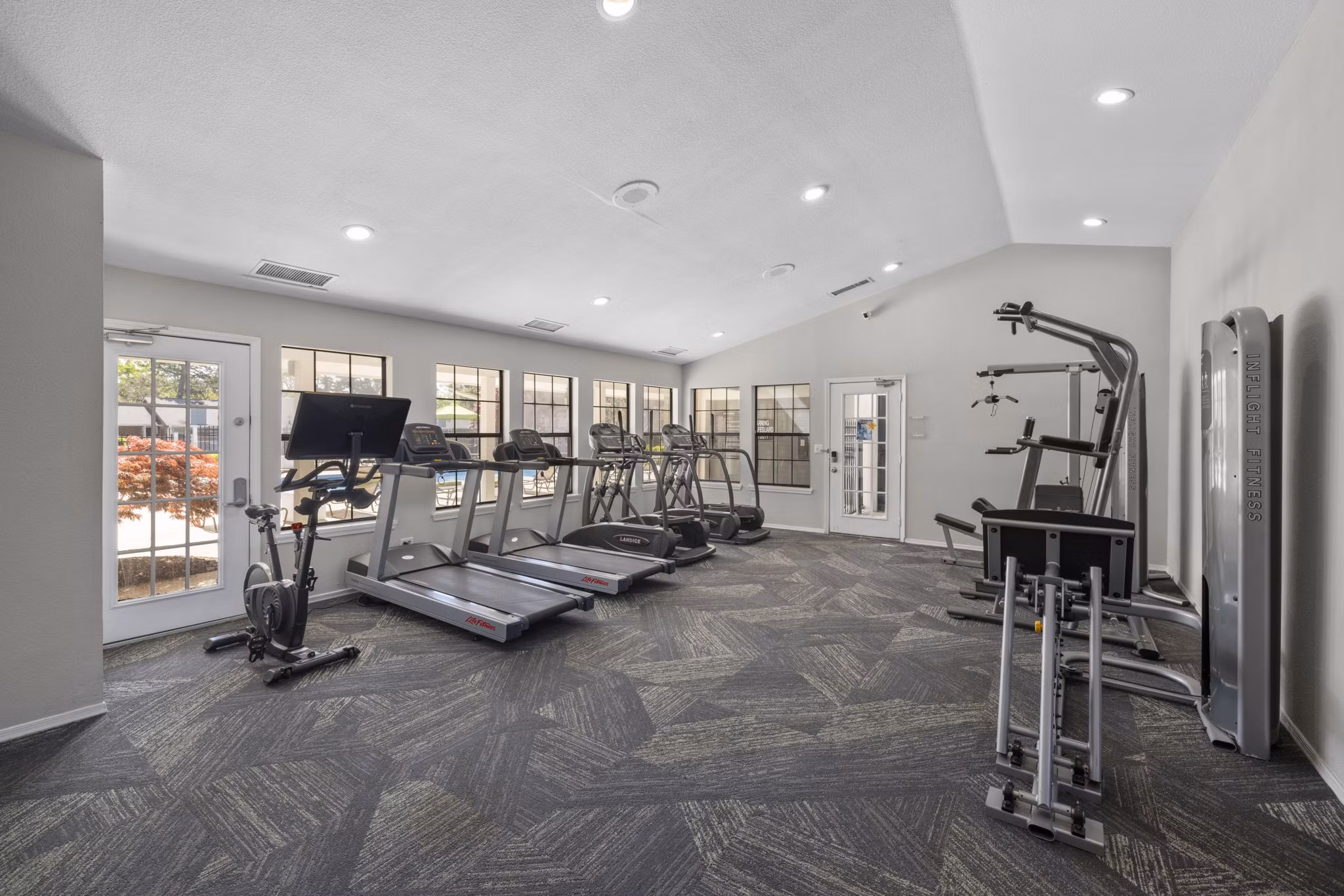 Modern fitness center featuring state-of-the-art equipment at Duraleigh Woods Apartments