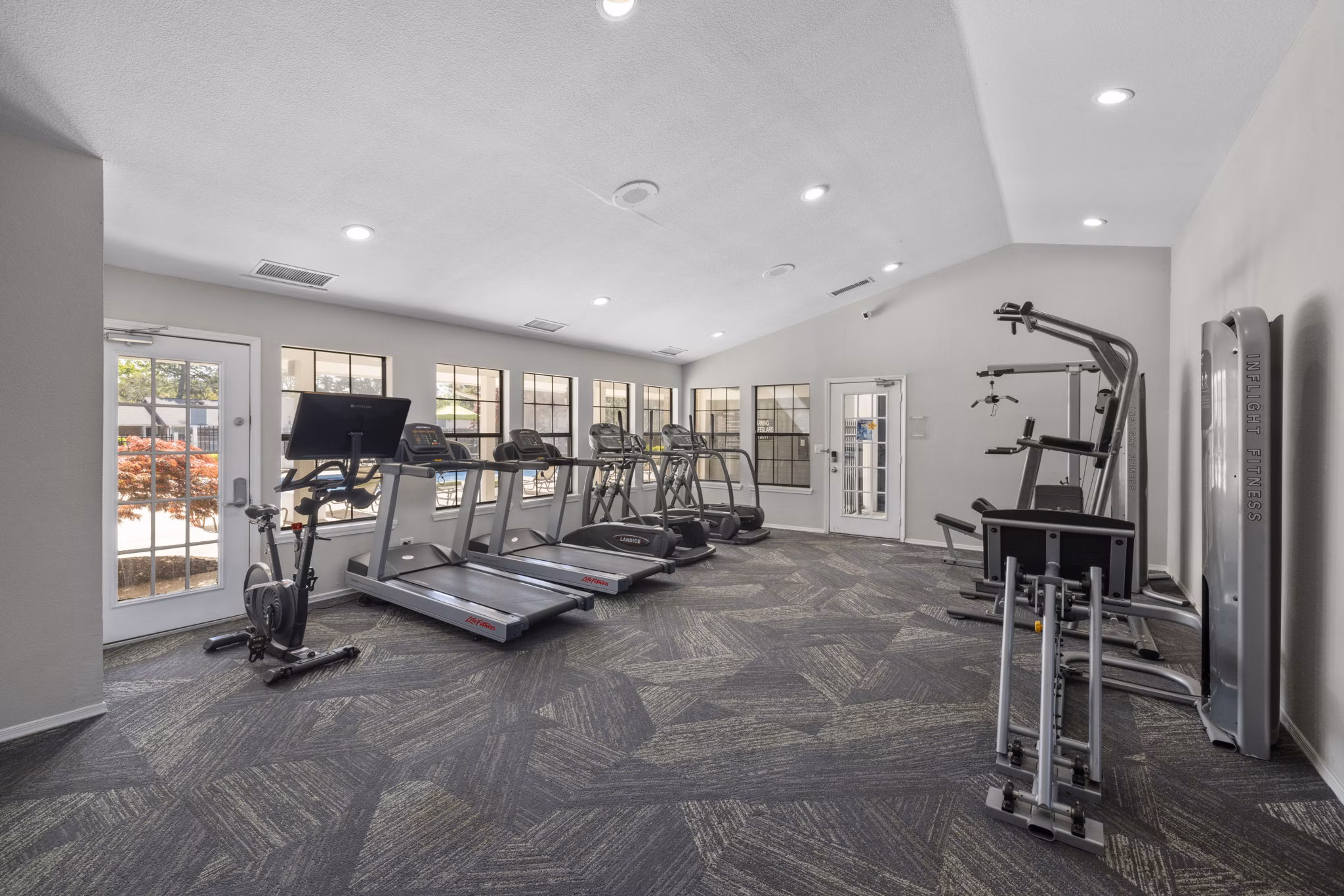 Modern fitness center featuring state-of-the-art equipment at Duraleigh Woods Apartments