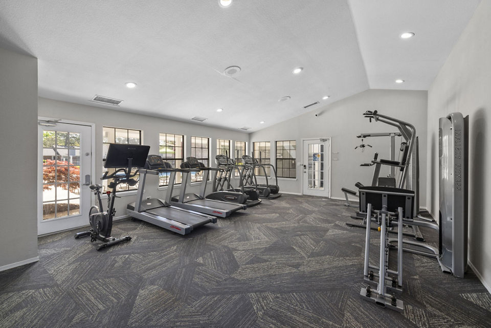 Modern fitness center featuring state-of-the-art equipment at Duraleigh Woods Apartments