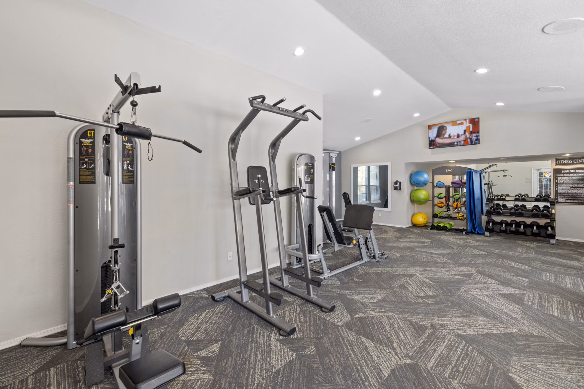 fitness center at Duraleigh Woods Apartments