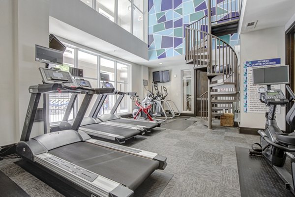 fitness center at Mosaic South End Apartments