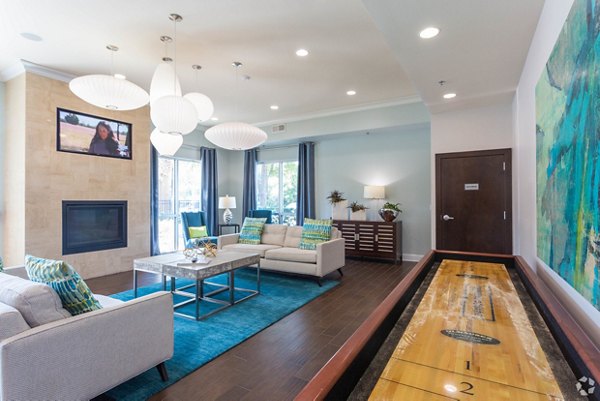 clubhouse game room at Central Square at Watermark Apartments