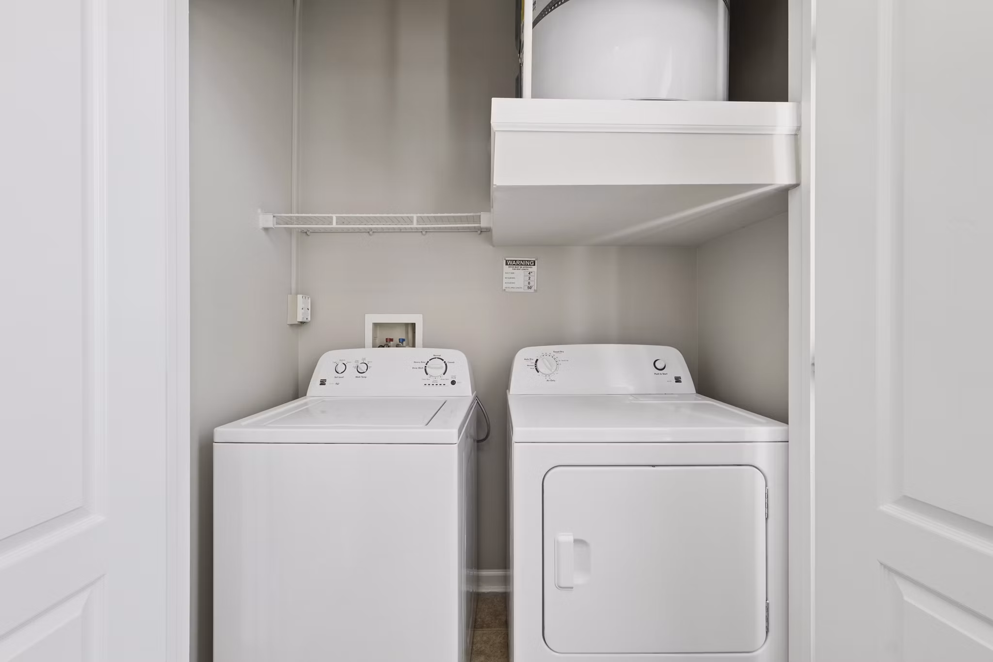 laundry room at Central Square at Watermark Apartments
