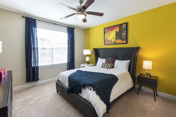 Bedroom featuring modern design and abundant natural light in Morgan Reserve Apartments