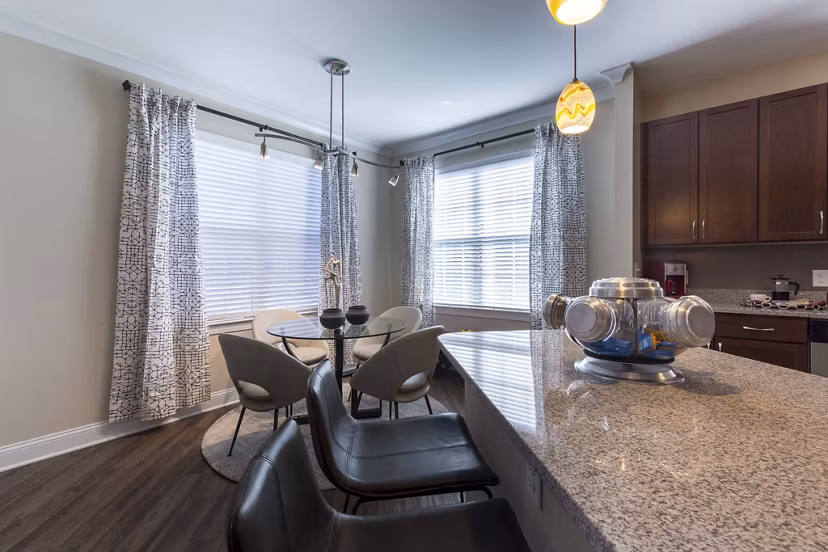Dining room featuring elegant modern decor in Morgan Reserve Apartments