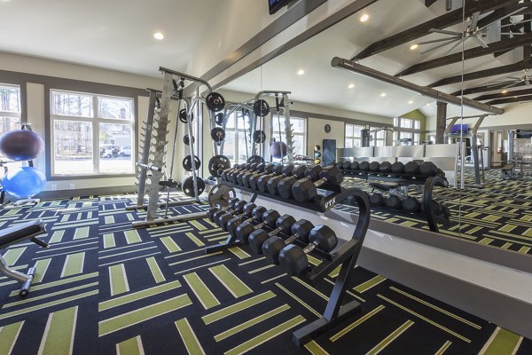 Modern fitness center with state-of-the-art equipment at Morgan Reserve Apartments