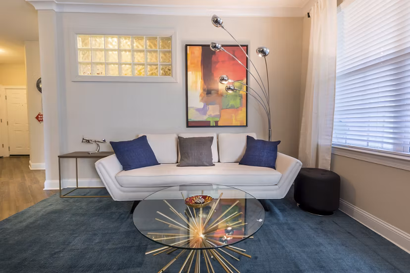 Modern living room with elegant furnishings at Morgan Reserve Apartments