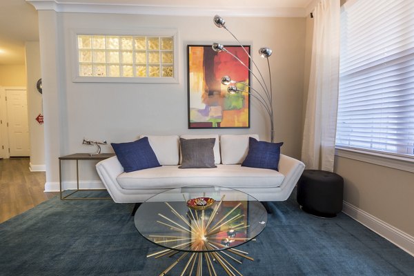 Modern living room with elegant furnishings at Morgan Reserve Apartments