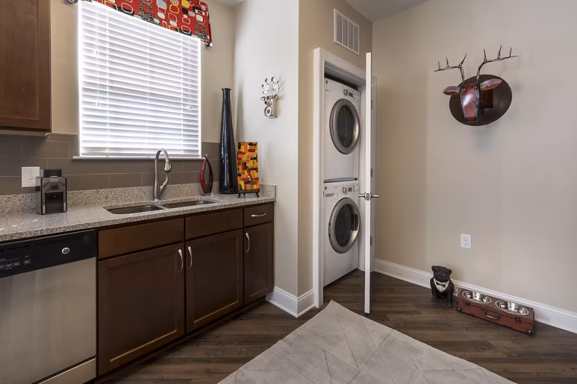 Laundry room with modern appliances at Morgan Reserve Apartments