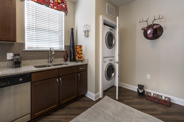 Laundry room with modern appliances at Morgan Reserve Apartments