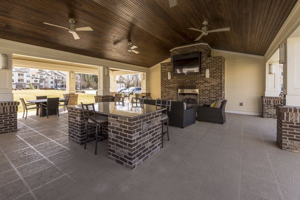 Morgan Reserve Apartments: Stylish patio with modern seating and lush greenery perfect for relaxation