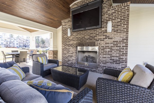 Scenic outdoor patio with stylish furniture at Morgan Reserve Apartments