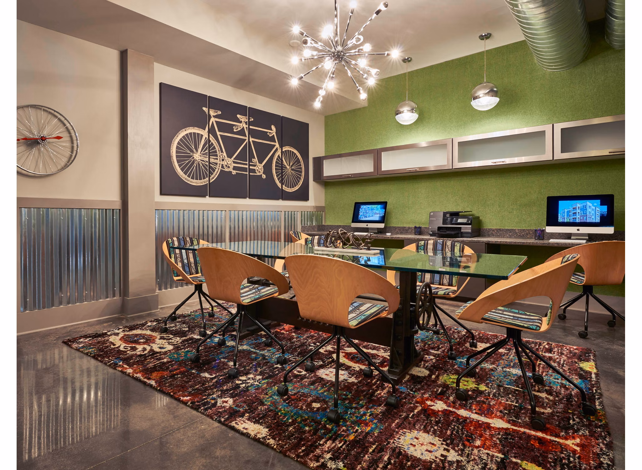 Clubhouse at Yards at Noda Apartments: Modern social space with cozy seating and contemporary design elements in Charlotte, North Carolina