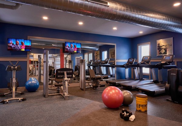 Modern fitness center with state-of-the-art equipment at Yards at Noda Apartments