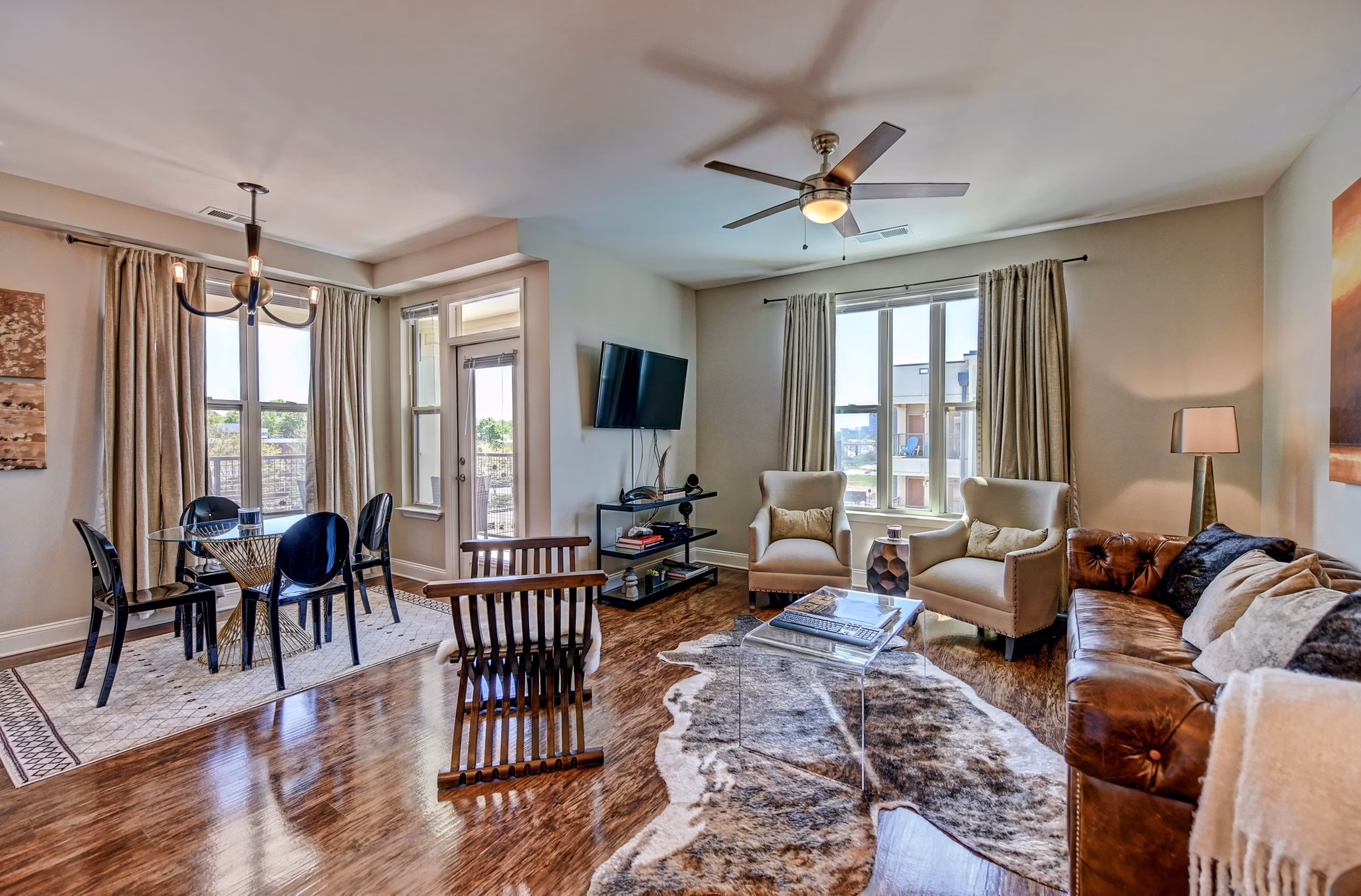 Elegant living room with contemporary decor at Yards at Noda Apartments
