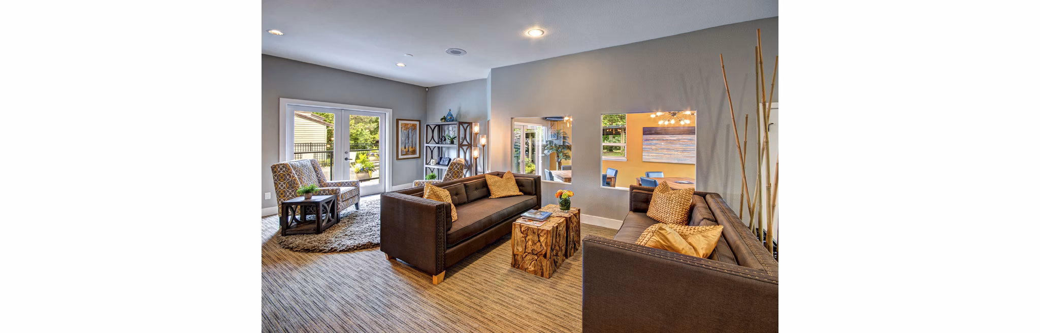 Chic clubhouse with cozy seating and modern decor at Hampton Greens Apartments