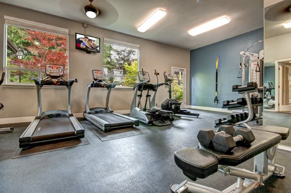 State-of-the-art fitness center with modern equipment at Hampton Greens Apartments