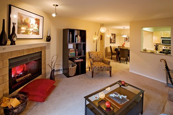Spacious living room with modern decor at Hampton Greens Apartments