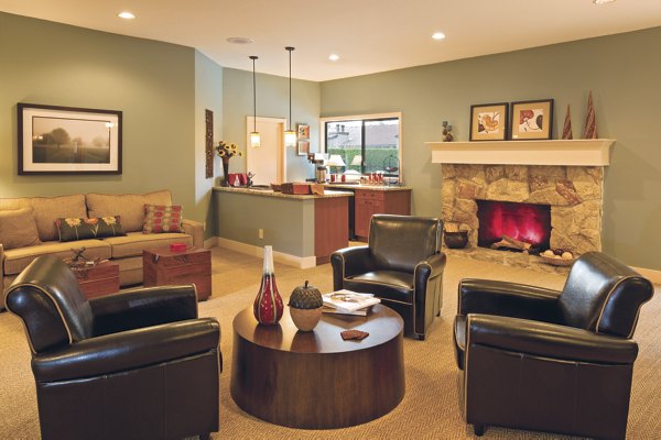 Spacious living room with modern furnishings in Hampton Greens Apartments
