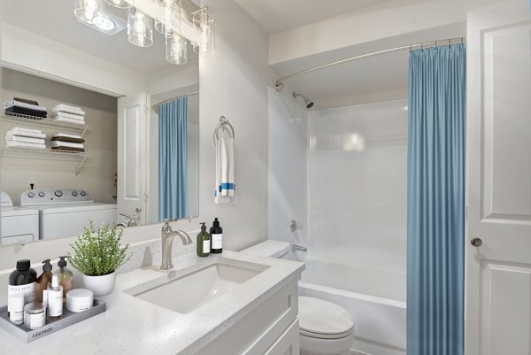 Luxurious bathroom with marble finishes at BluWater Apartments