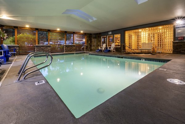 Expansive outdoor pool at BluWater Apartments offering relaxation and luxury living