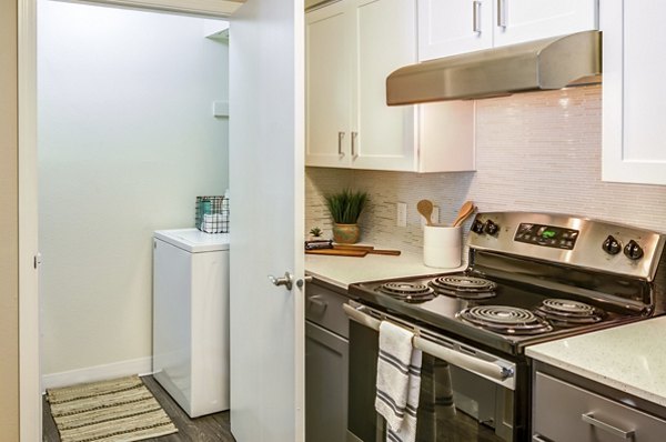 Spacious kitchen with modern appliances in Arya at Hedges Creek Apartments