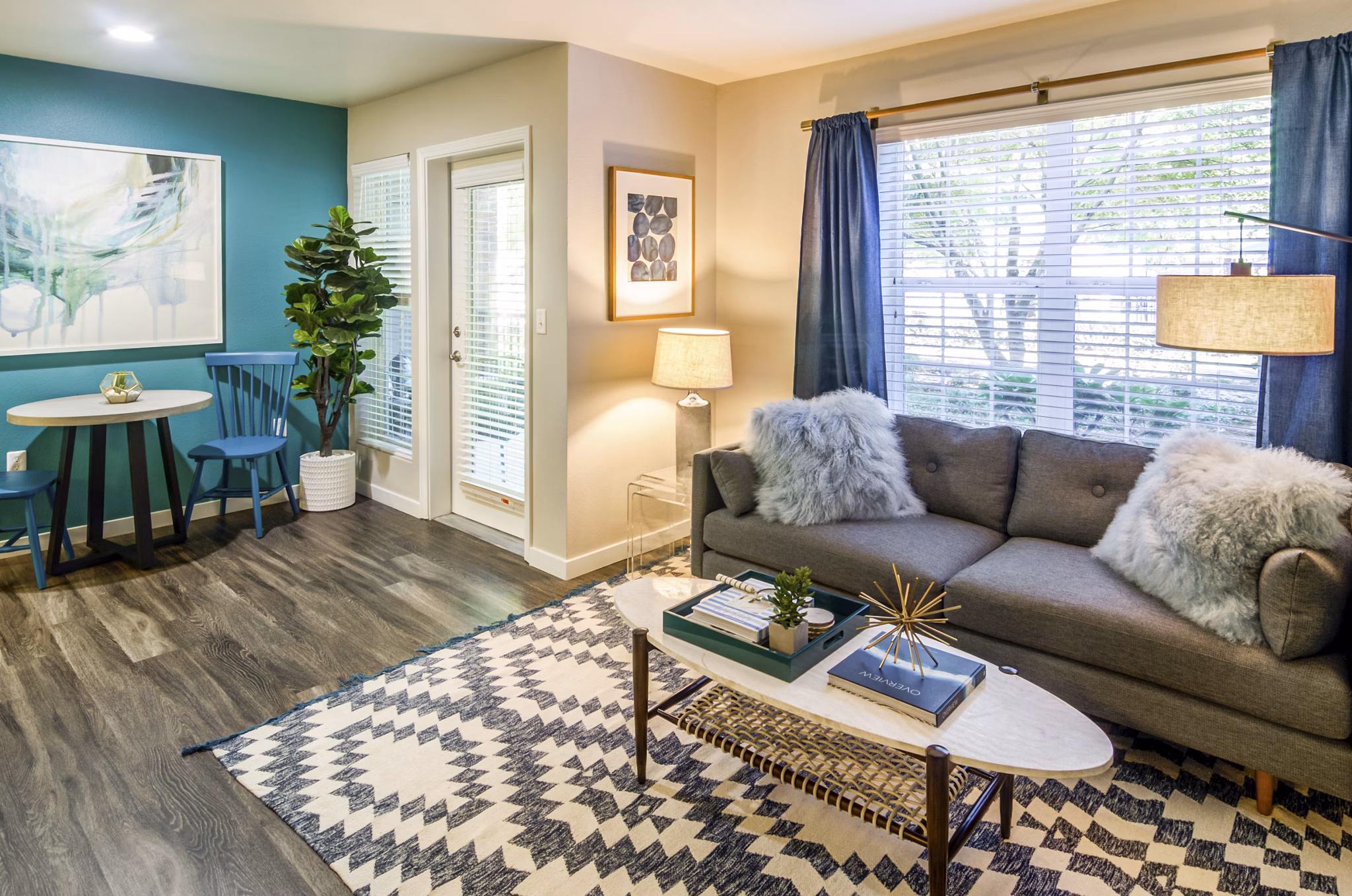 Spacious living room with modern decor at Arya at Hedges Creek Apartments
