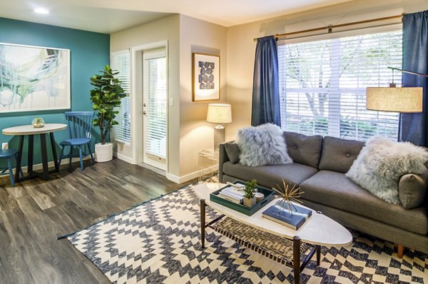 Spacious living room with modern decor at Arya at Hedges Creek Apartments